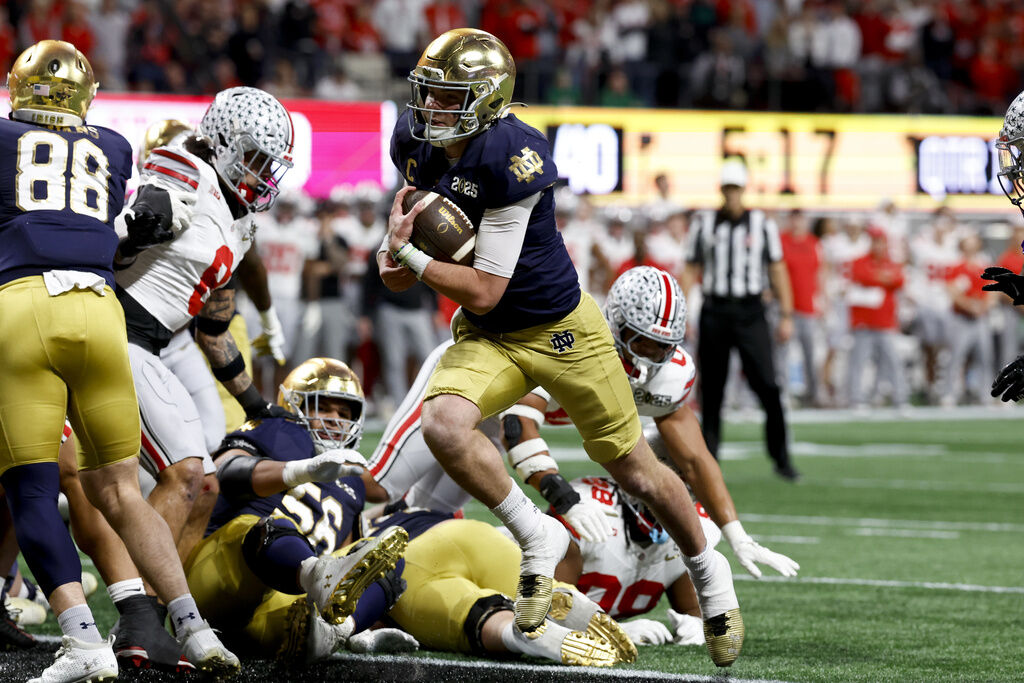 Ohio State wins 1st national title since 2014 outlasting Notre Dame 34 23 in CFP championship game Wisconsin Collegiate Athletics gmtoday
