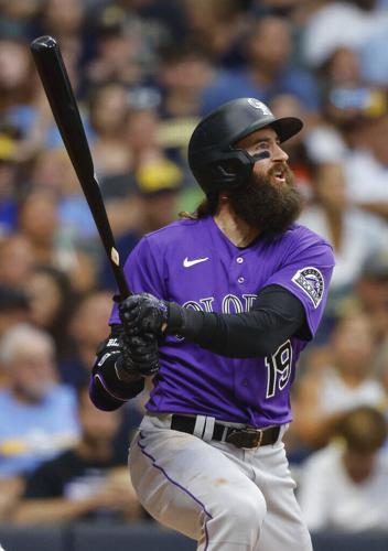 Brewers edge Rockies 6-5 in 13, extend their NL Central lead - The