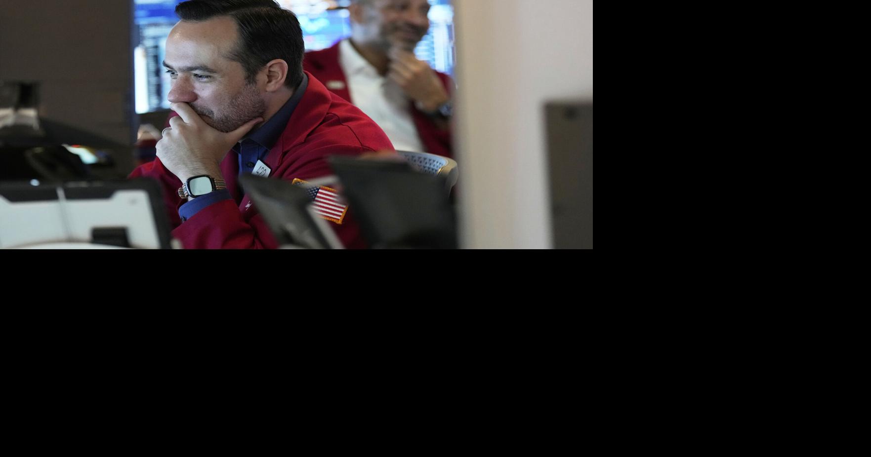 Wall Street hangs near its record Monday amid doubts about Trump's tariffs