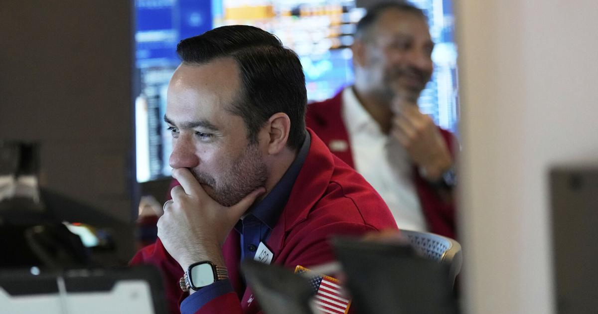 Wall Street hangs near its record Monday amid doubts about Trump's tariffs