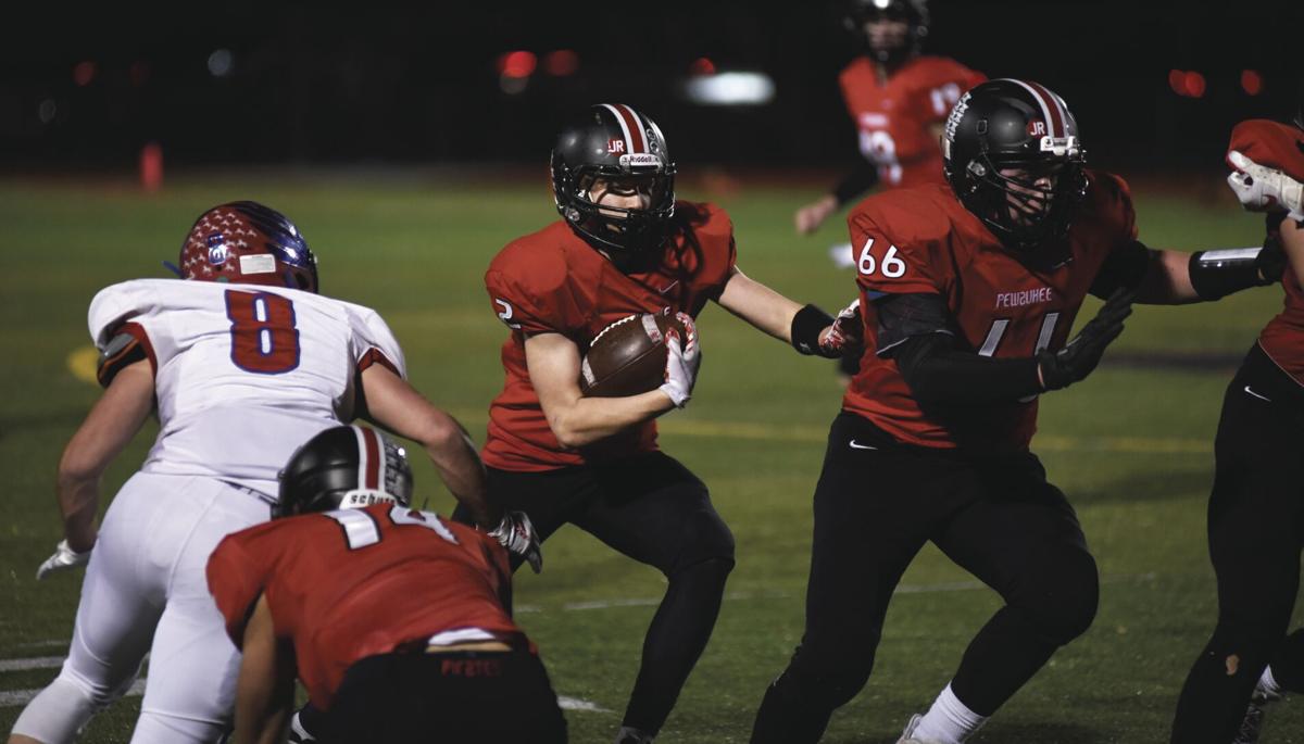 Slinger at Pewaukee football Slideshows