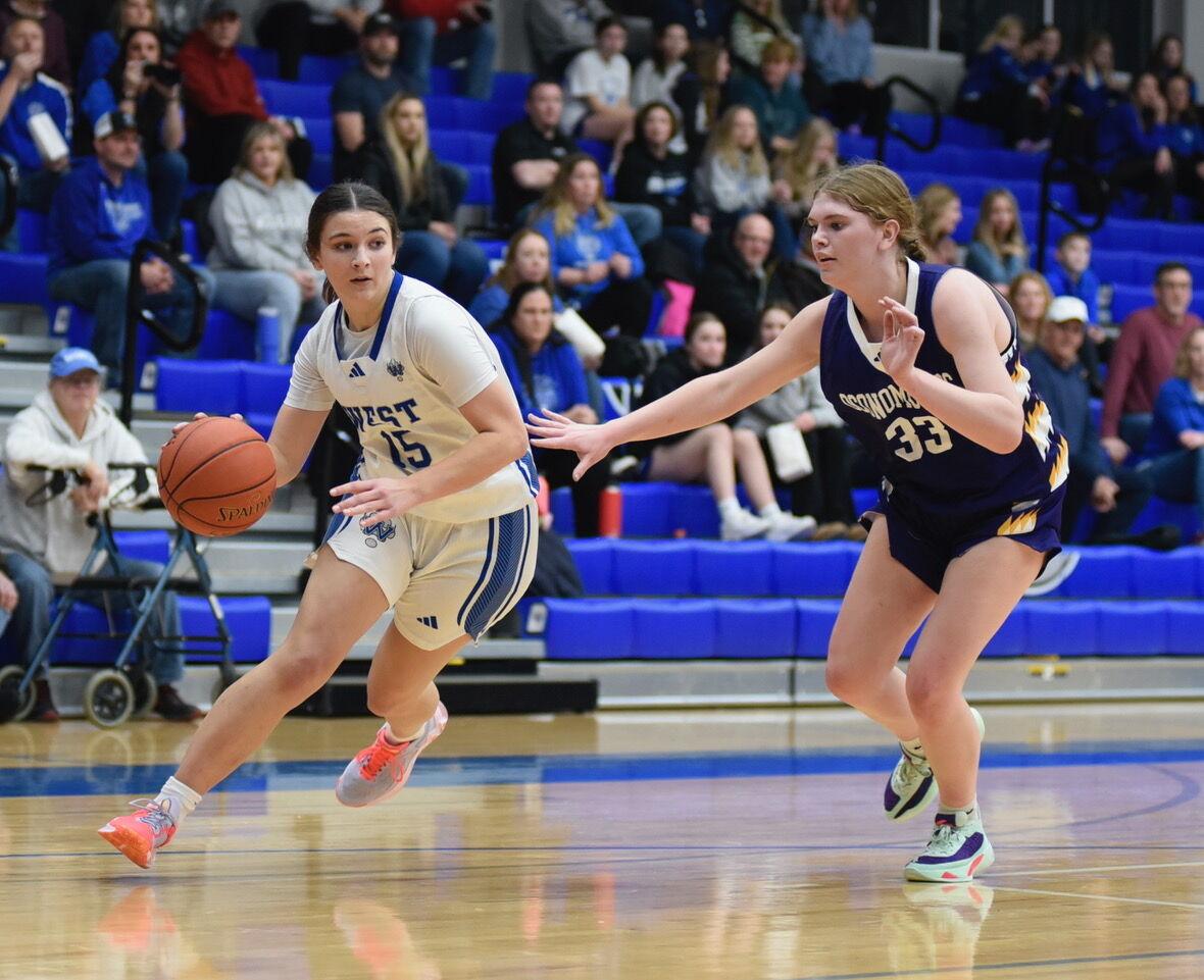 Fenske makes the difference: Junior scores career-high 29 points to lead  Wolverines past Raccoons, Waukesha Co. Sports