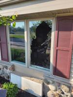 Deer crashes through window in Mukwonago, leaves the same way it came in