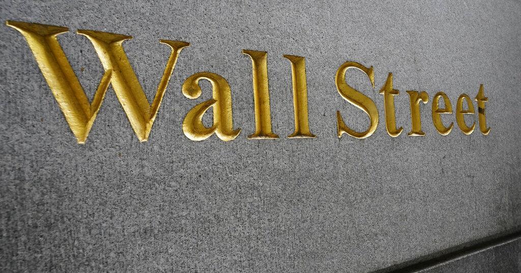 Wall Street is split Tuesday as Tesla and tech drop while most other US stocks climb