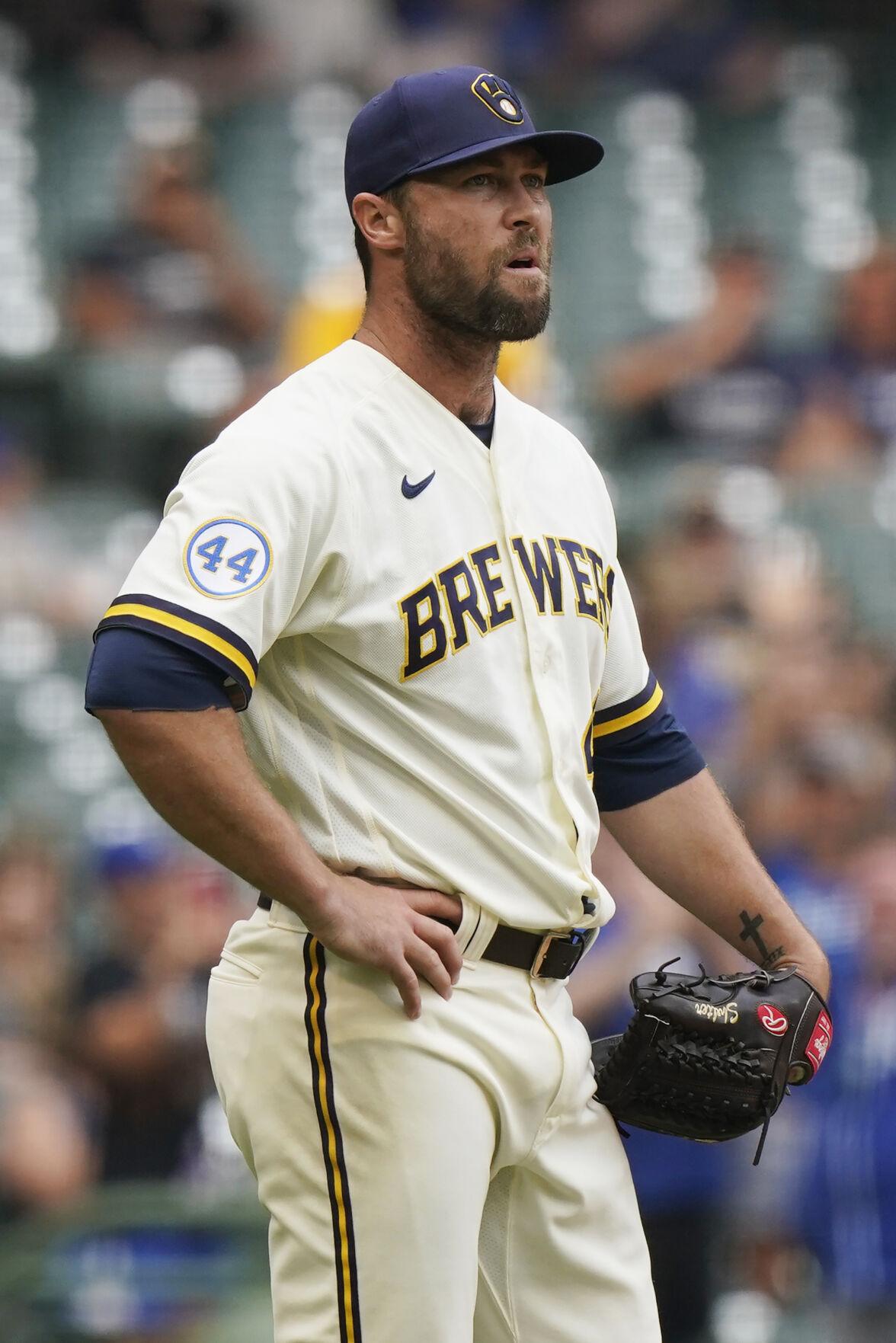 Brewers add relievers Norris and Curtiss in trades