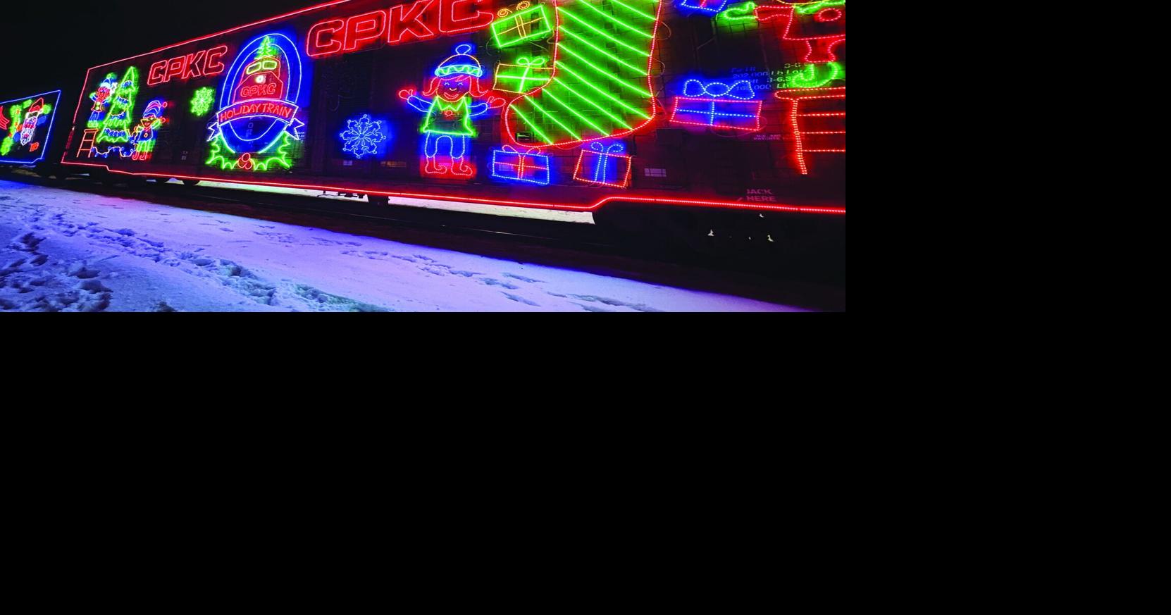 Winter magic: Families gather trackside for holiday train