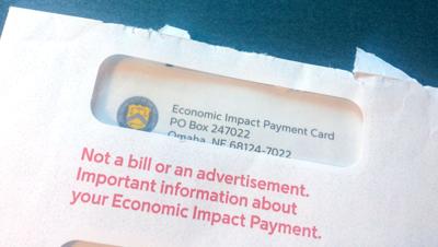 Millions of stimulus payments were mailed as prepaid debit cards. Some say they look like scams ...