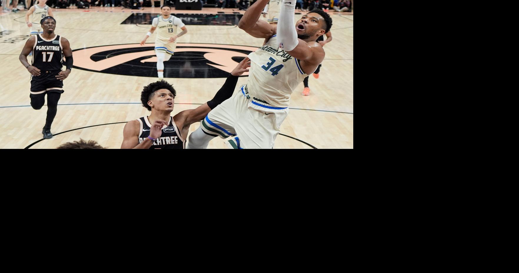 Antetokounmpo and the Bucks hold off Atlanta 112-110 to snap a three-game skid