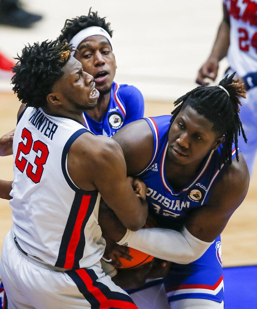 Louisiana Tech forward Kenneth Lofton Jr. advances the ball against  Mississippi State during an NCAA college basketball game in the semifinals  of the NIT, Saturday, March 27, 2021, in Frisco, Texas. (AP