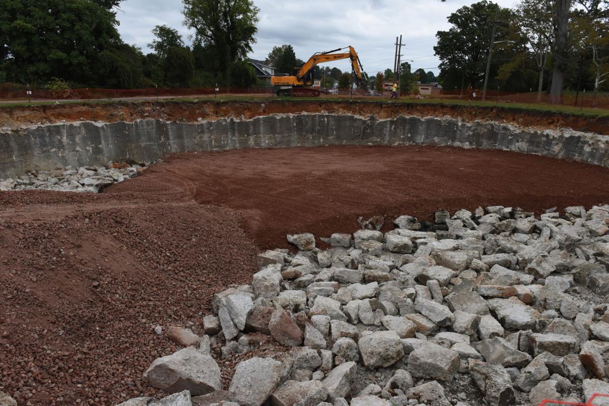Old Dan River Inc. water retention pond being demolished ...