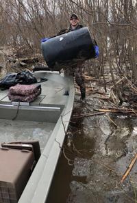 Volunteers clean up everything from toilets to wood-fired cook stoves from river banks