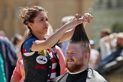 7 barbers ticketed for cutting hair at state Capitol 