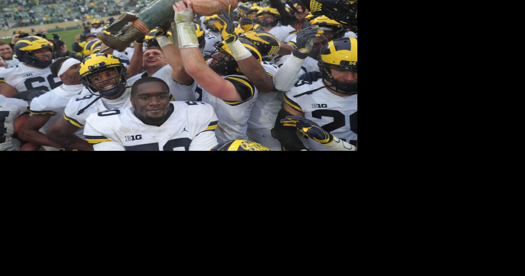 Michigan football powers through rival Michigan State in emotional ...