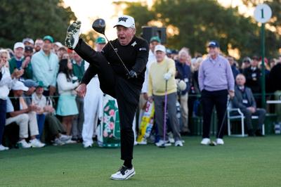 A wild hook and a big leg kick as Nicklaus, Player and Watson open the ...