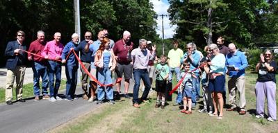 ‘It’s a part of the fabric of our community:’ Spring Lake Township celebrates opening of State Road bike path