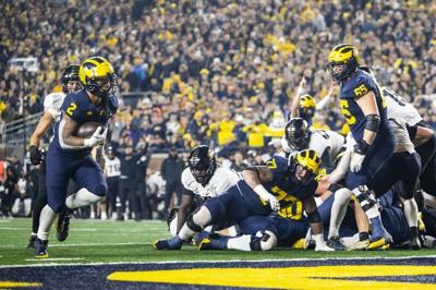 Michigan Run Out Michigan run game 'definitely getting better,' faces test in stout Penn ...