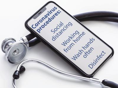 Coronavirus procedures on cellphone with stethoscope (copy)