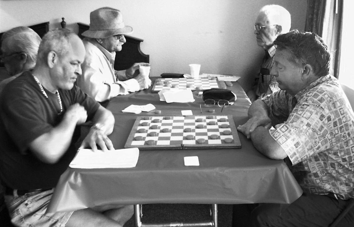 State crowns checkers player