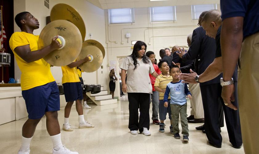 Role models provide inspiration, highfives on first day of school at