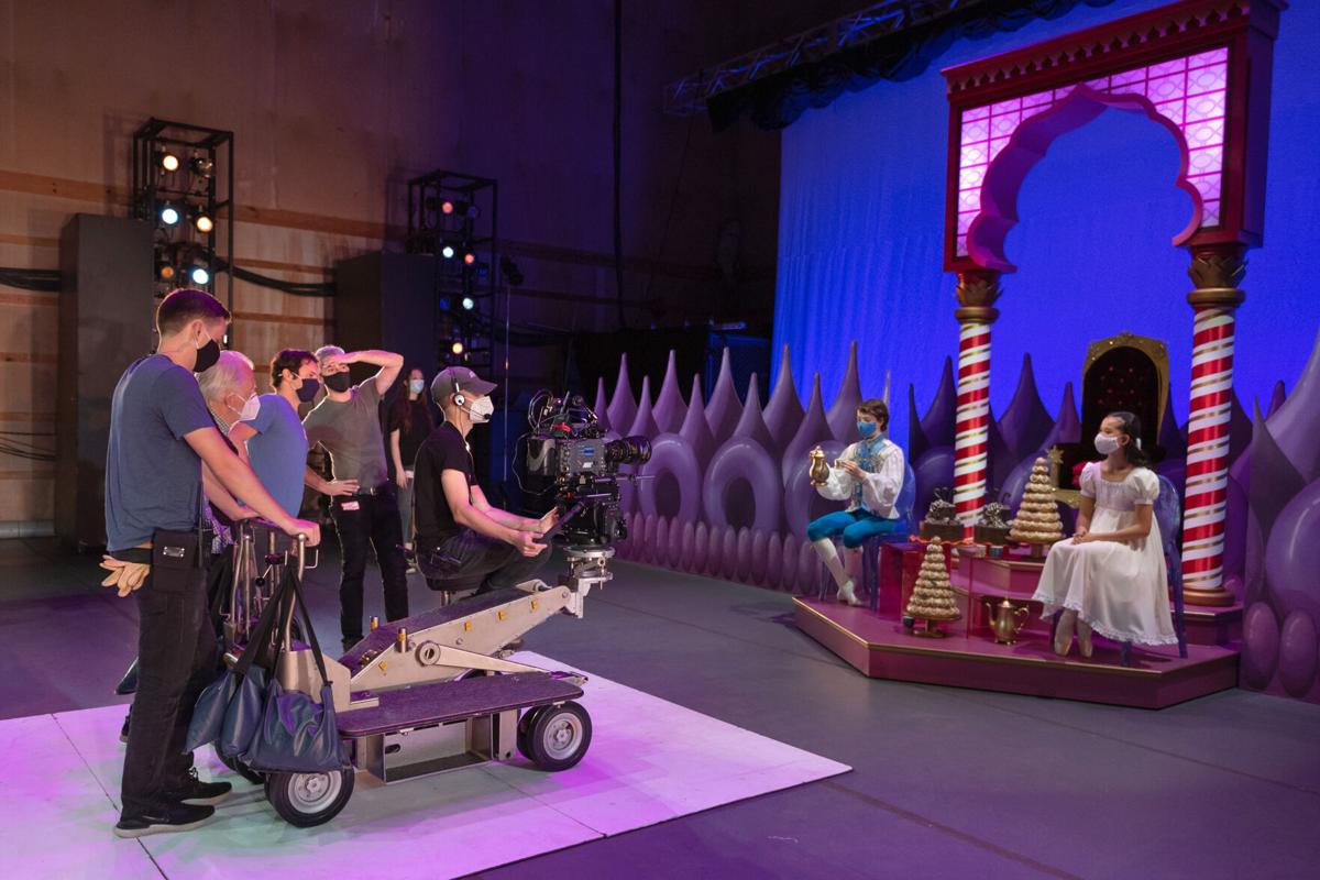 Filming a scene in the Land of Sweets for the UNCSA Nutcracker film are, from left to right: Carter Bailey, Thomas Ackerman, Ilya Kozadayev, Jared Redick, Mitchell Brinker, and Julian Pecoraro as the Nutcracker Prince and Emma Cilke as Clara.