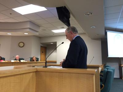 Tom Terrell speaks the terms of the agreement with the council