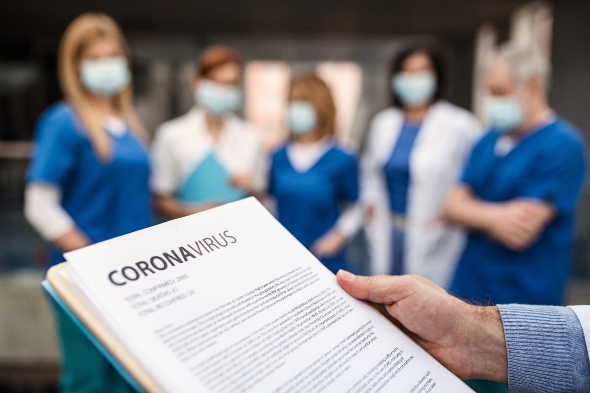 Group of doctors talking about coronavirus on conference covid-19 (copy)