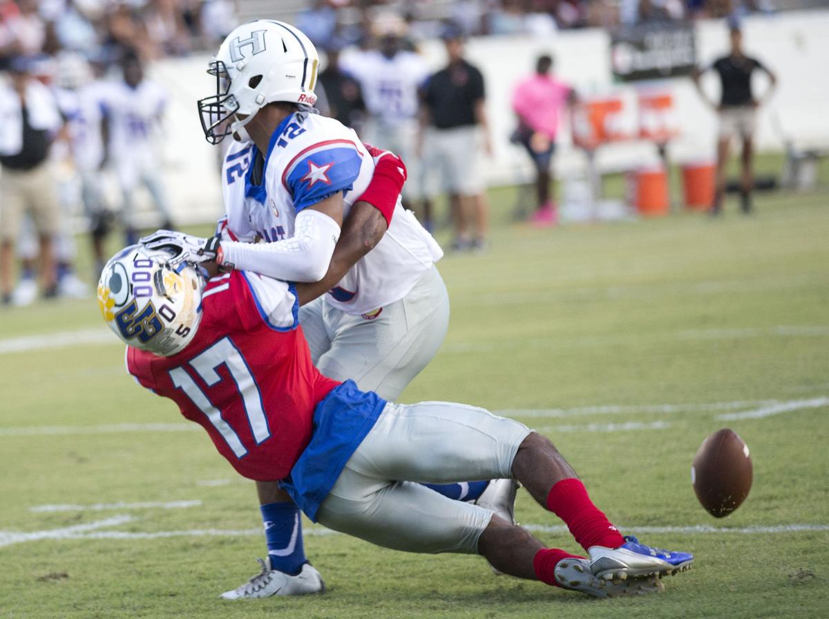 East outlasts West in N.C. football allstar game Football
