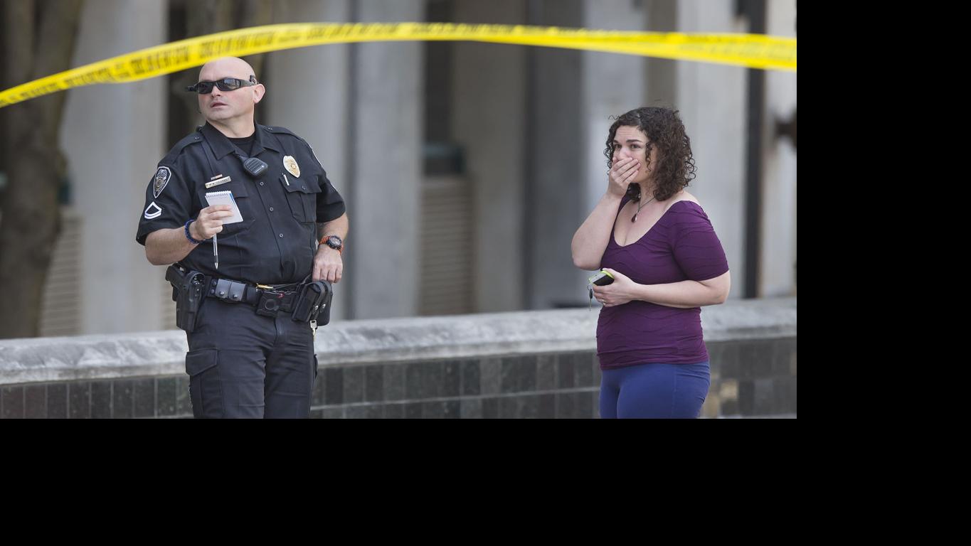 Update Police identify woman who jumped from parking garage (VIDEO