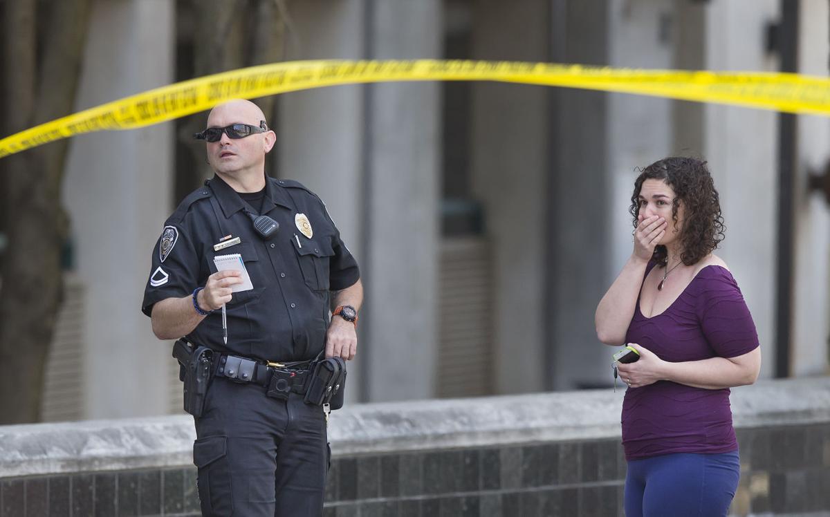Update Police identify woman who jumped from parking garage (VIDEO