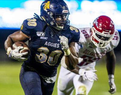 A T Notebook Jah Maine Martin Follows Blocks To Rushing Success Ncat Greensboro Com