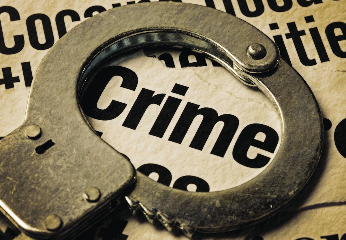 handcuffs crime.jpg (copy) (copy)