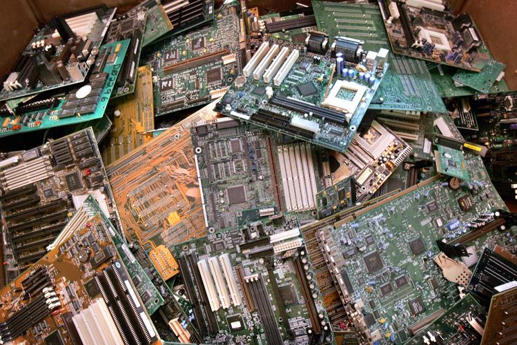 Old Computer Motherboards. Piles of Obsolete Hardware and
