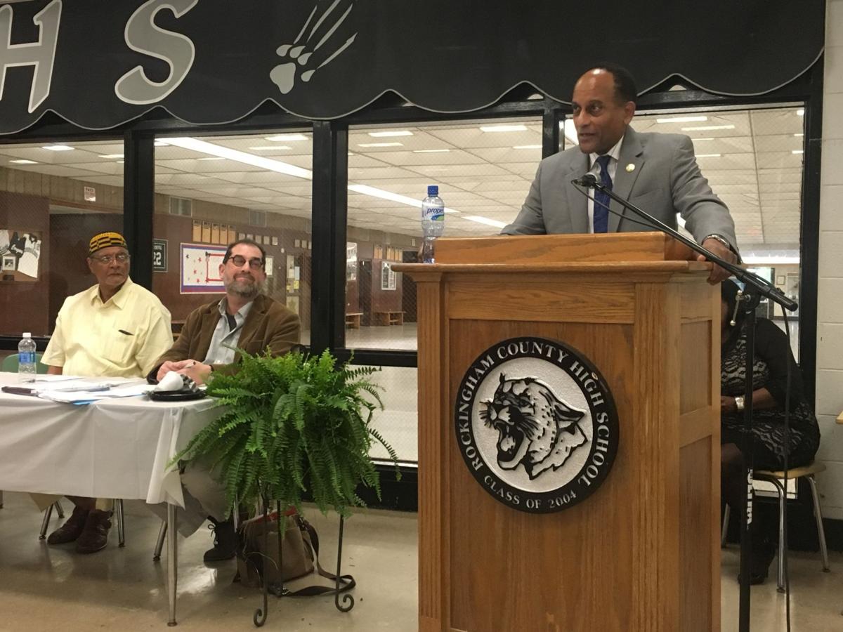 (Right to left) North Carolina House Democratic Leader Larry Hall speaks at the convention as N.C. Senate Candidate Eric Fink and African American Caucus of the Rockingham County Democratic Party President Richard Ratliff listen on.
