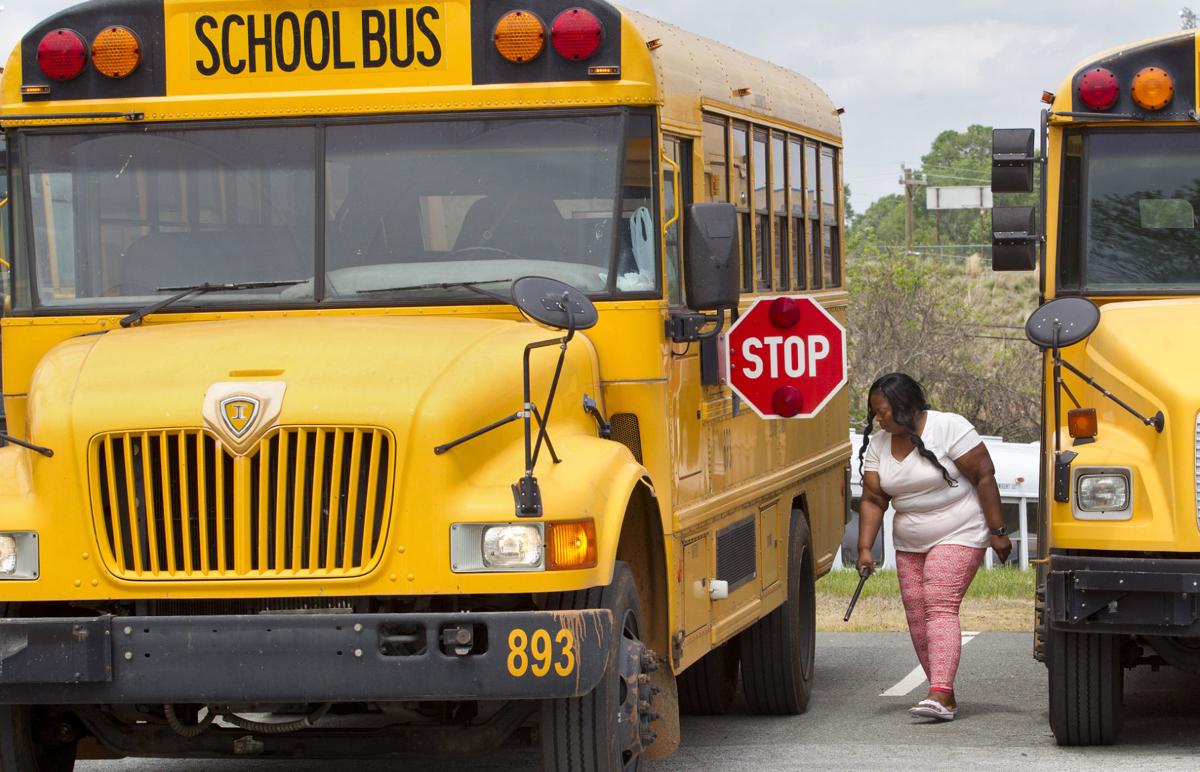 Pay increases for teachers, bus drivers are proposed for Guilford 2019
