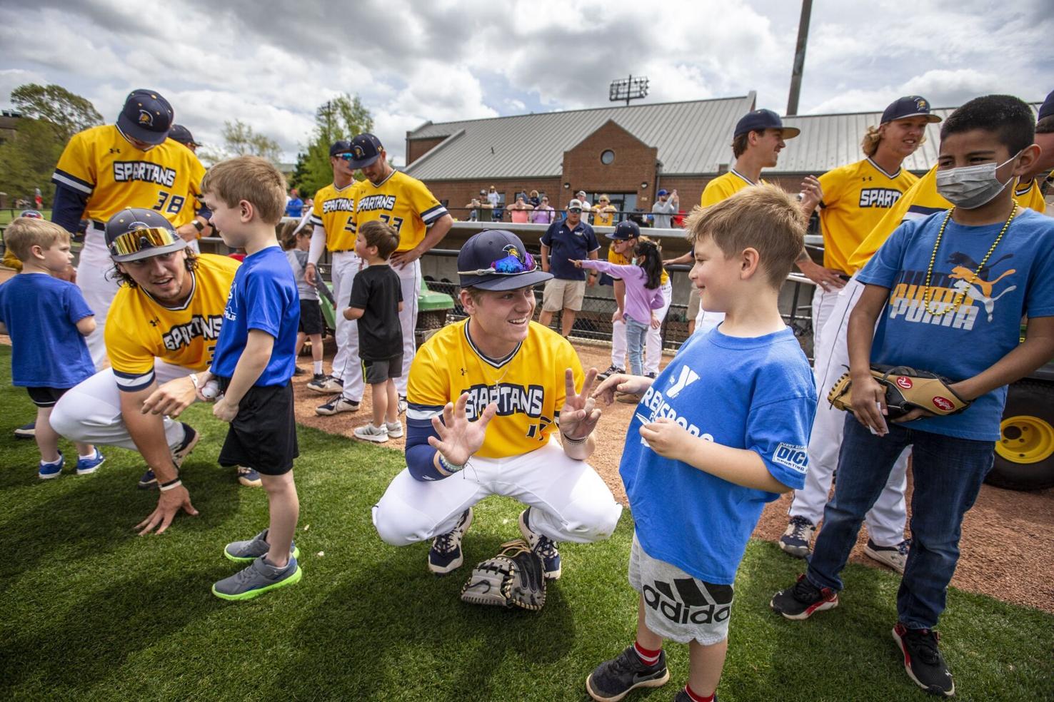 PHOTOS UNCG baseball players host children for Easter activities