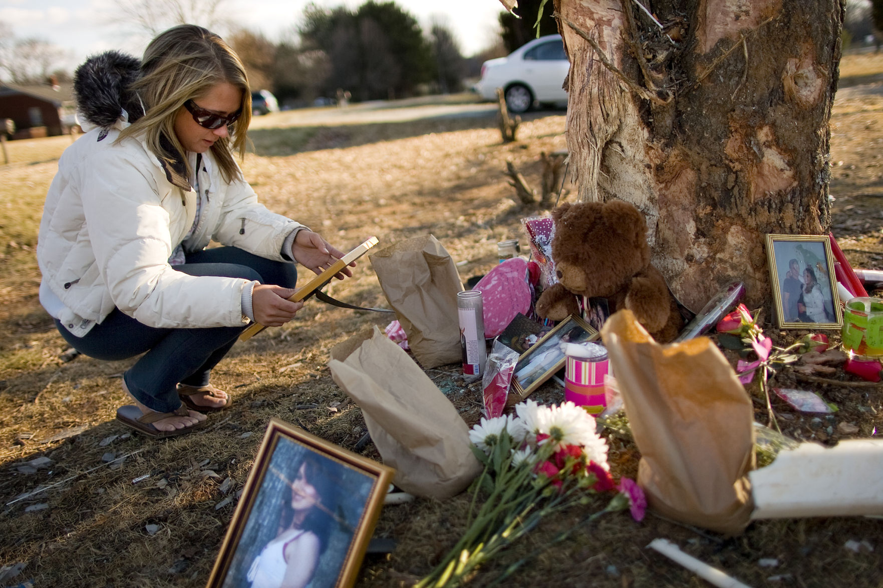 Friends create shrine at site of fatal wreck