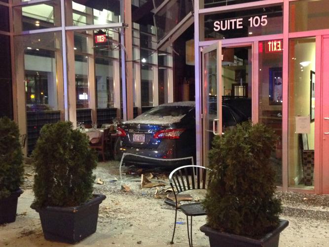 Car crashes into downtown restaurant