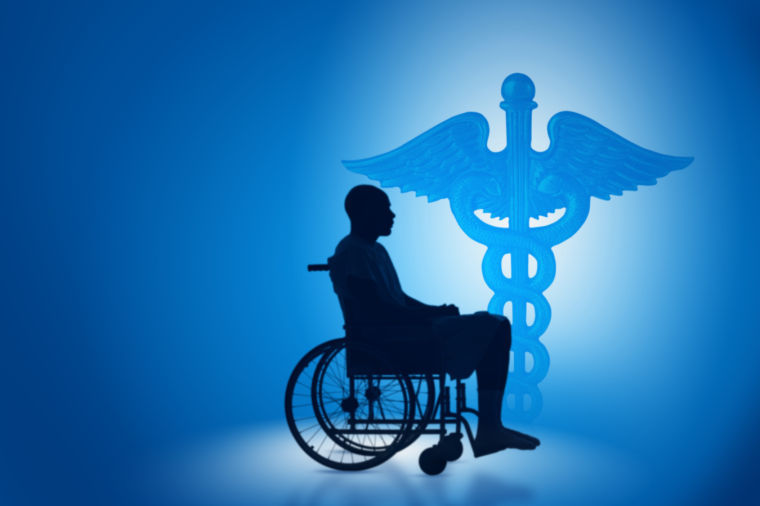 Caduceus and silhouette of man in wheelchair health care hospital