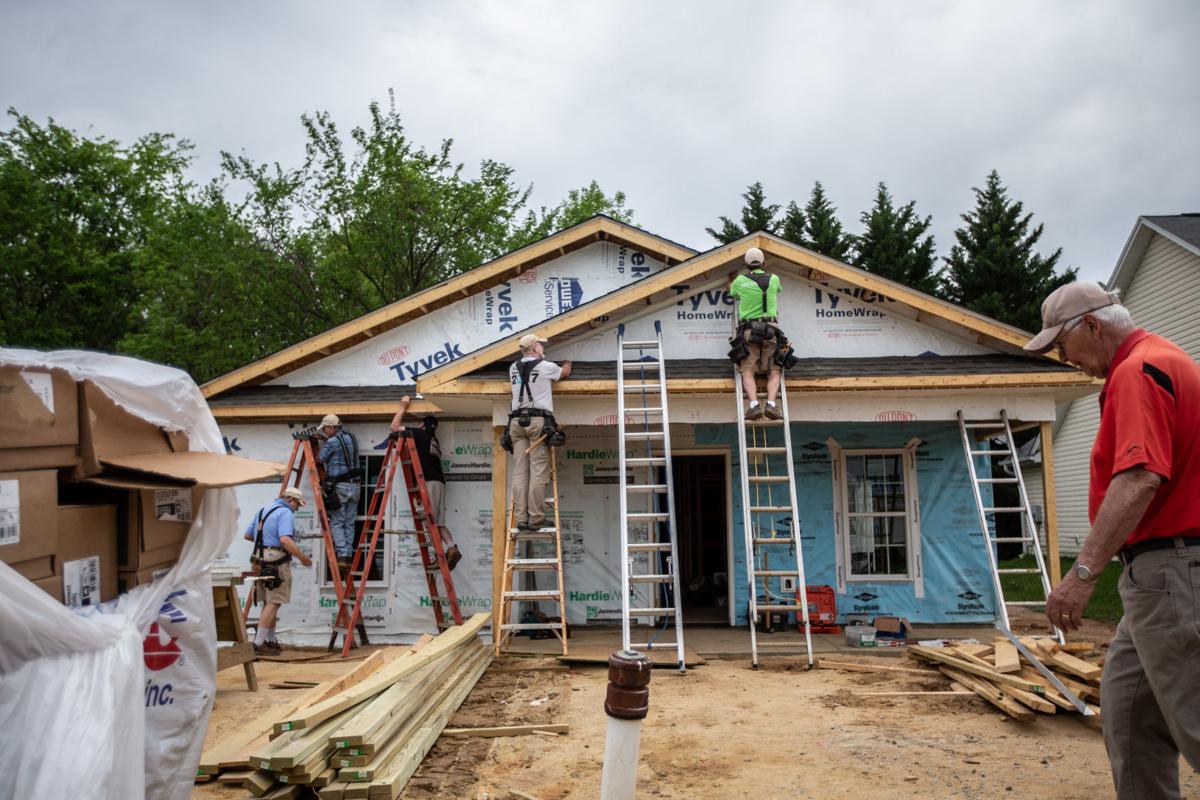 Painting by numbers As Habitat for Humanity builds homes in Greensboro