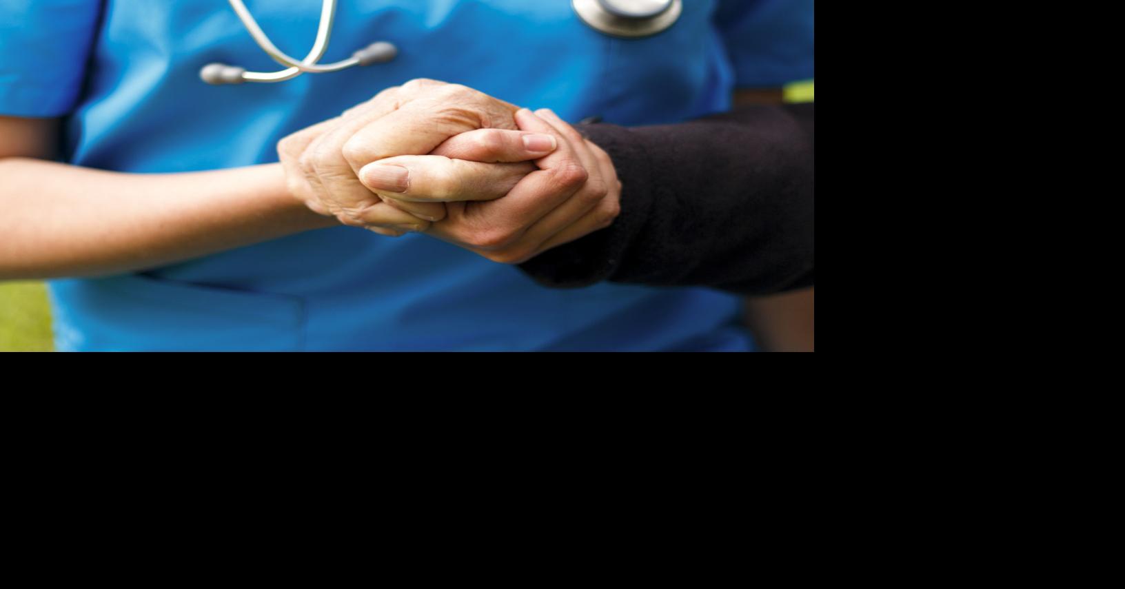 Doctor helping patient (copy) (copy)
