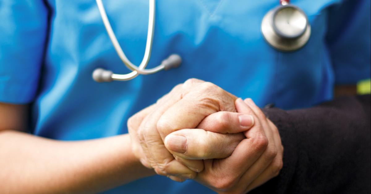 Doctor helping patient (copy) (copy)