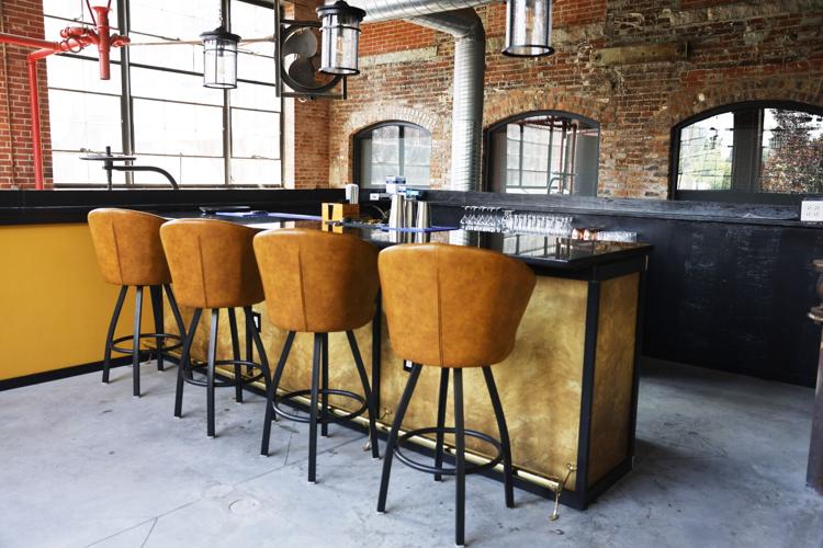 Couple opens Grapes and Grain bar in Revolution Mill