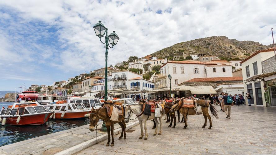 Hydra has no real roads, no cars, and no bicycles — so things are transported by donkeys. (Addie Mannan, Rick Steves’ Europe)