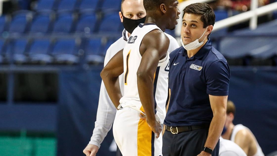 Wes Miller and Isaiah Miller help make history for UNCG's basketball program Wes Miller and Isaiah Miller help make history for UNCG's basketball program