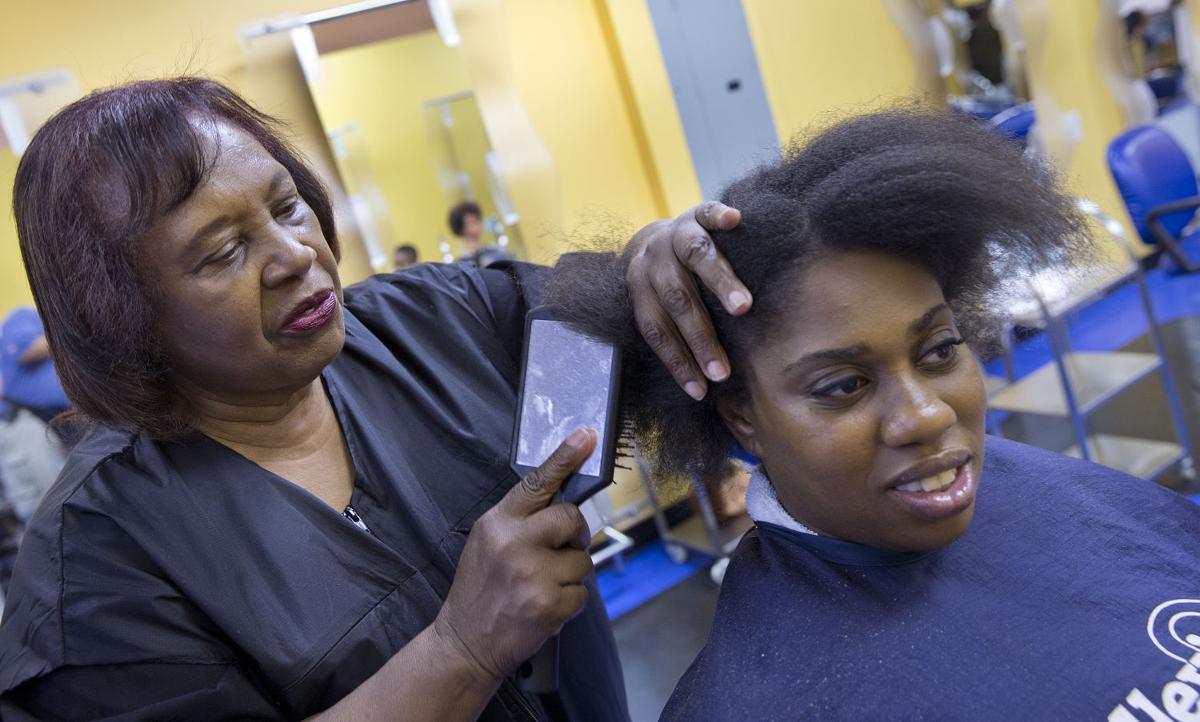 Woman enrolls in her own beauty school News