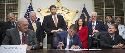 Gov. Pat McCroy Signs Into Law Immigration Bill (copy)