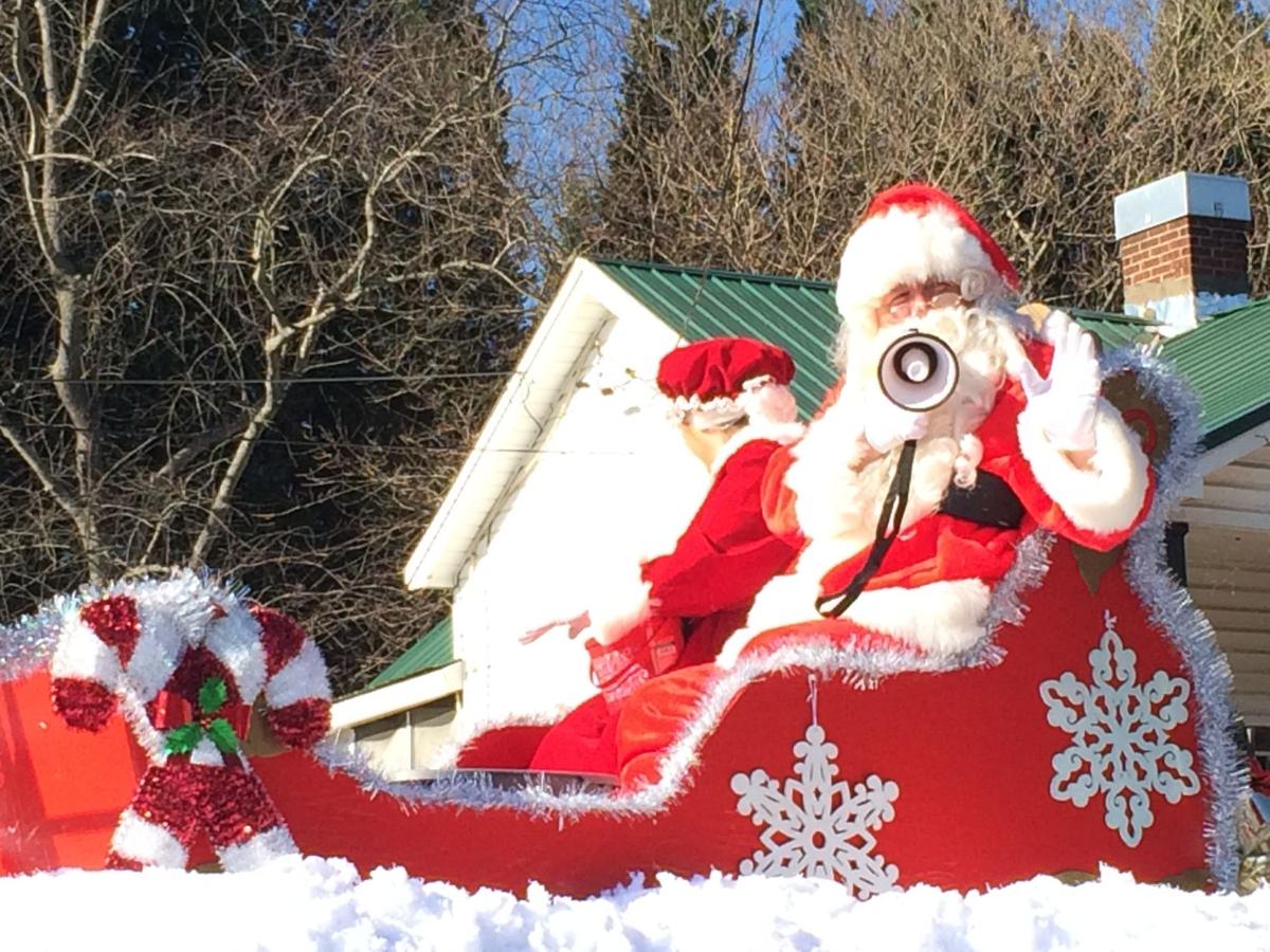 Santa hits the streets for MadisonMayodan Christmas Parade