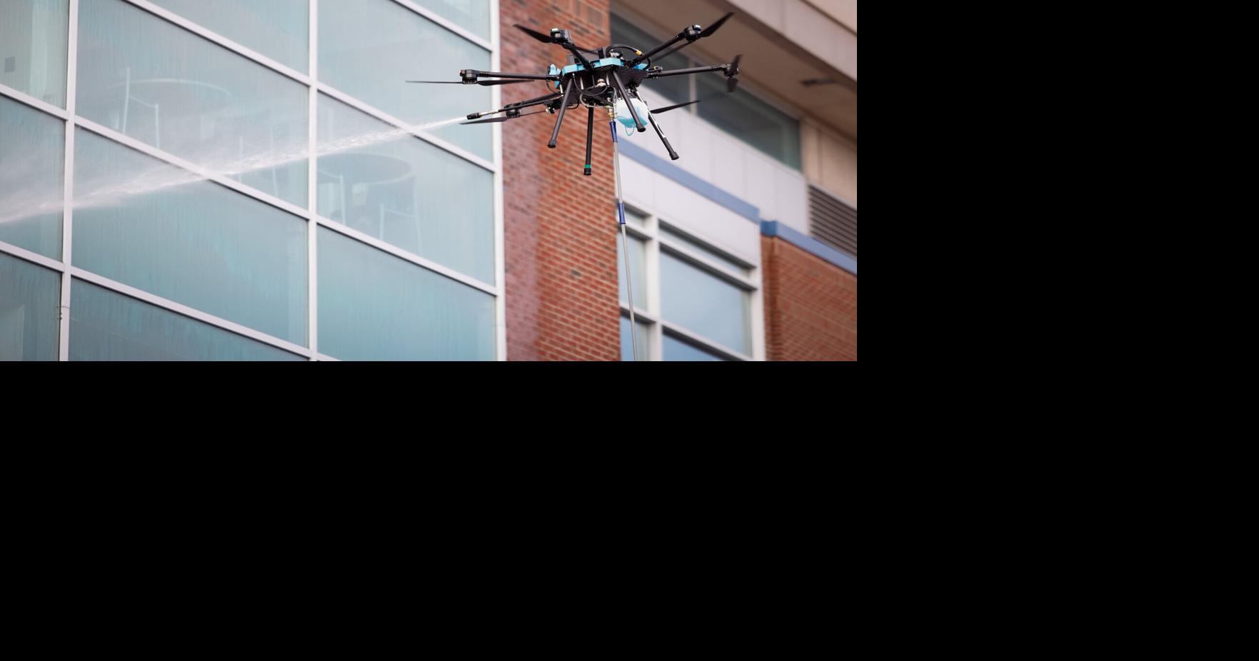 Watch as drone cleans coliseum windows in Guilford County NC