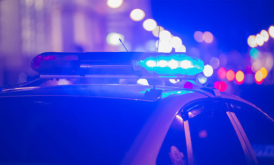 Police cruiser lightbar at night