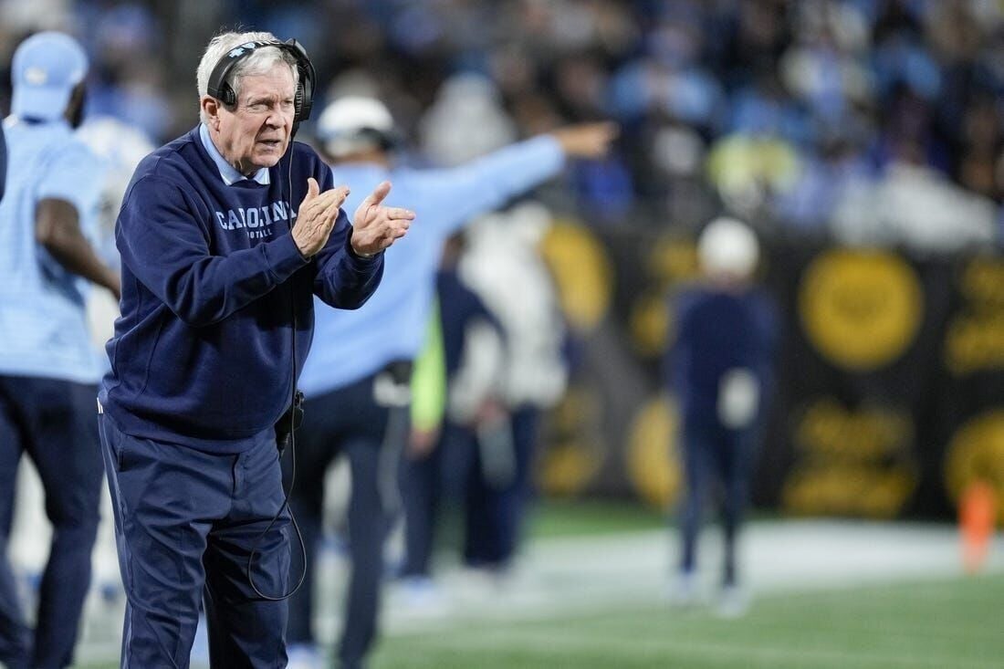 North Carolina, top defensive coach Gene Chizik part ways